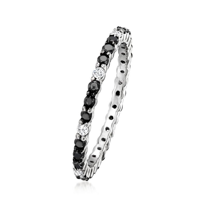Side view of 14kt white gold diamond eternity band with black and white bezel-set stones