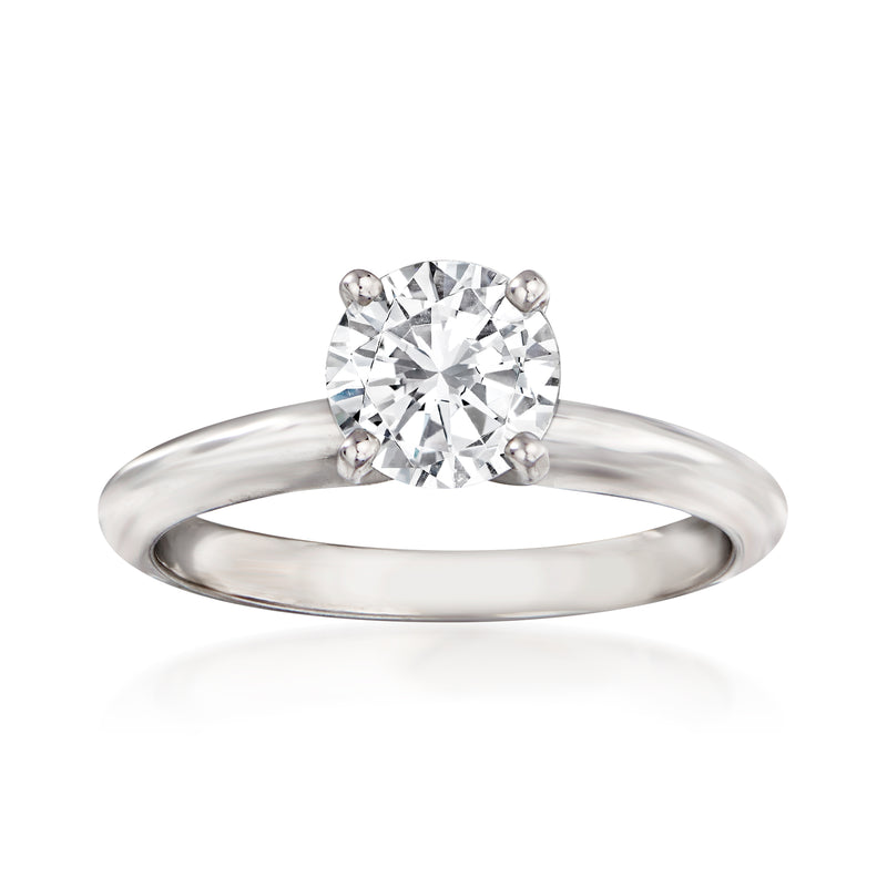 14kt white gold engagement ring with round brilliant center diamond, four-prong setting