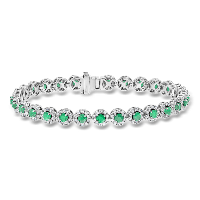 14kt white gold tennis bracelet with emerald-green stones and diamond accents