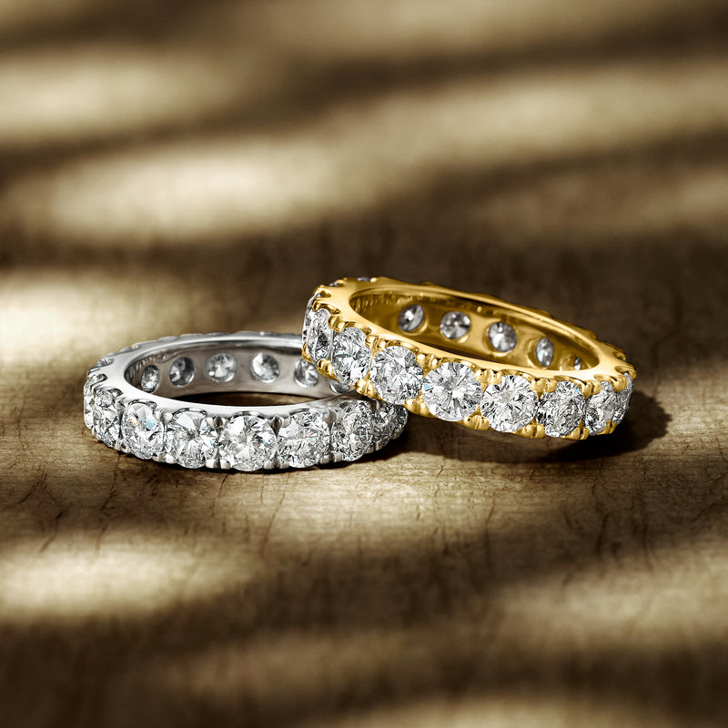 Two eternity bands: 14kt white gold diamond band and 14kt yellow gold diamond band