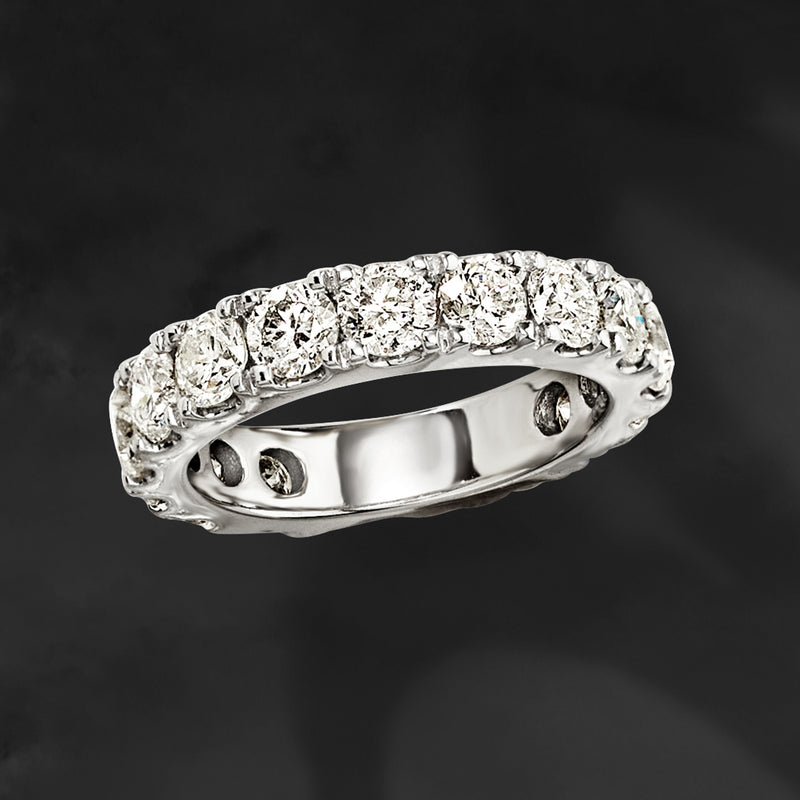14kt white gold diamond eternity band, angled side view with round stones
