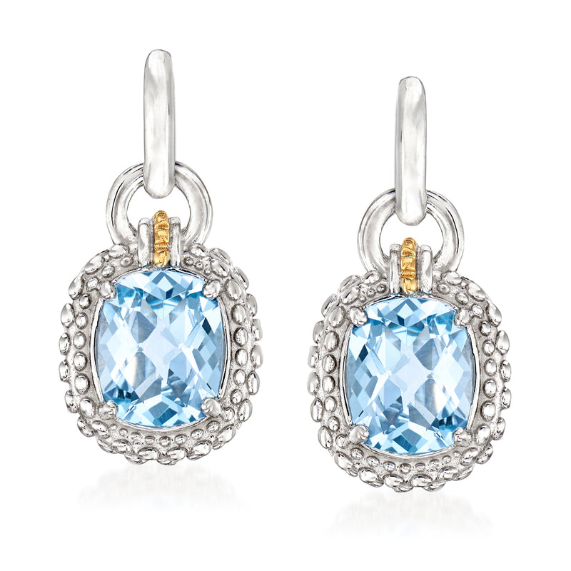Sterling silver blue topaz drop earrings with yellow gold accents, oval stones