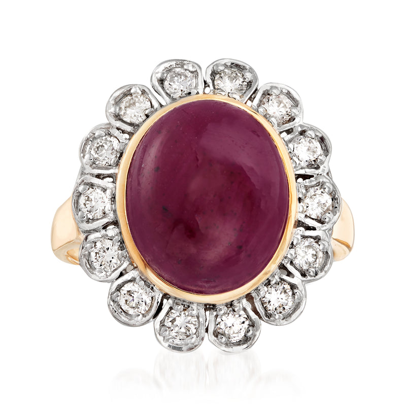 Round purple ruby cabochon halo ring in 14kt yellow gold with diamond accents
