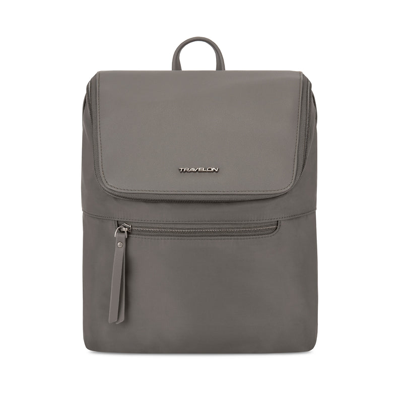 Dark brown anti-theft backpack with front flap, top handle, and front zip pocket