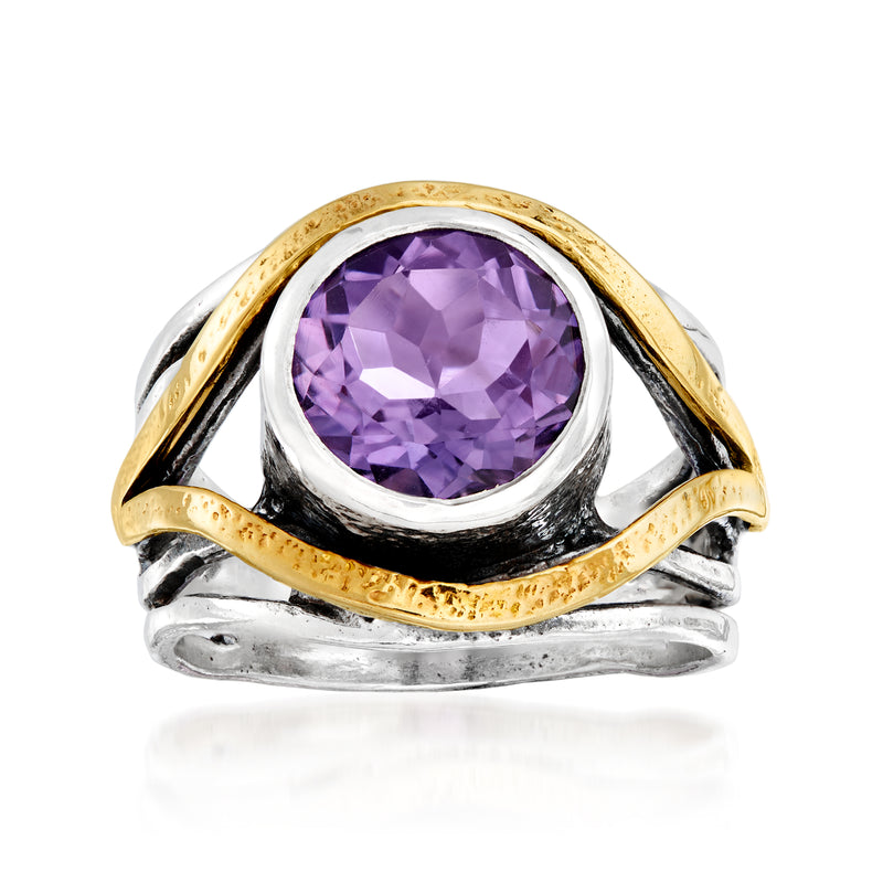 Sterling silver amethyst ring with oval purple gemstone and yellow gold bezel