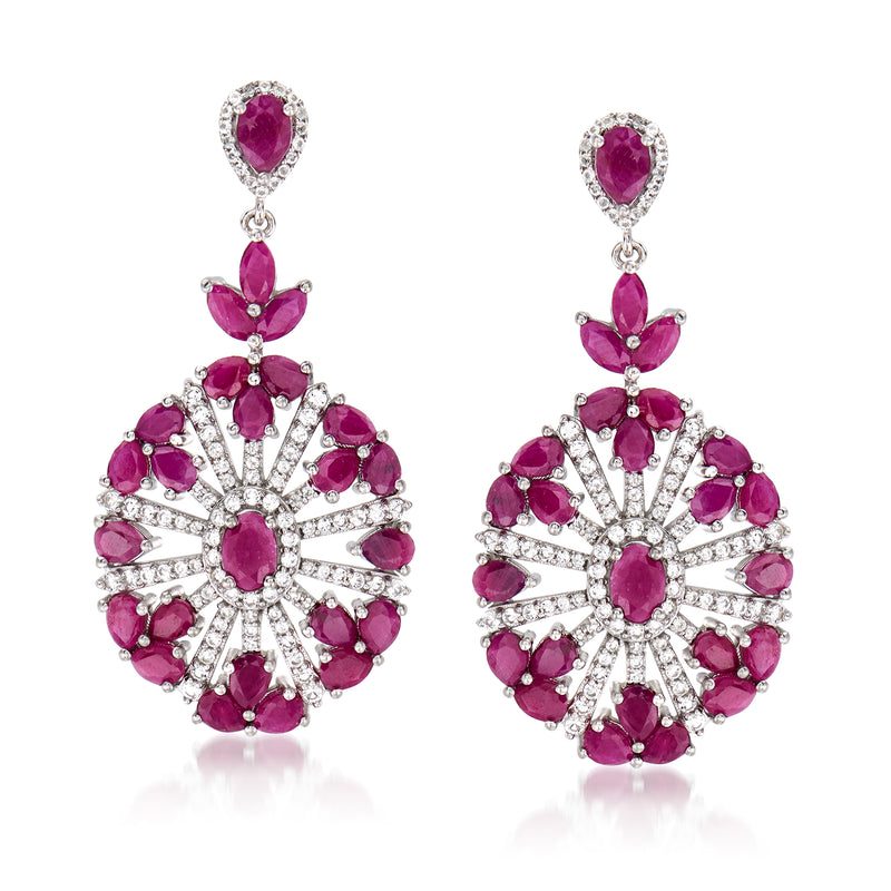 Sterling silver drop earrings with oval pink gemstones and white crystal starburst centers