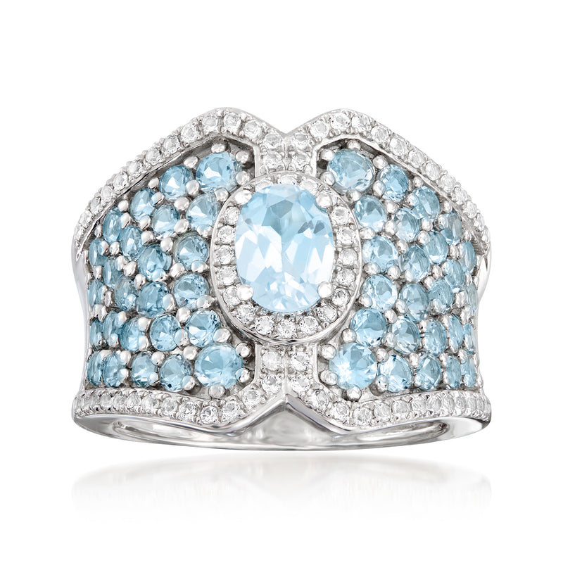 Sterling silver ring with oval sky blue topaz and pavé white topaz