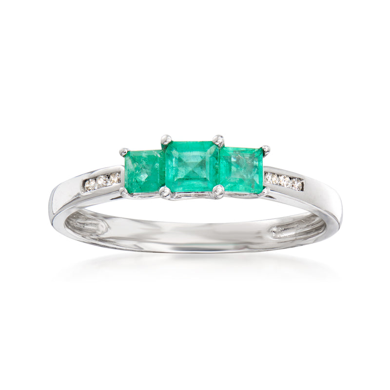 14kt white gold ring with three emerald-green stones and diamond accents