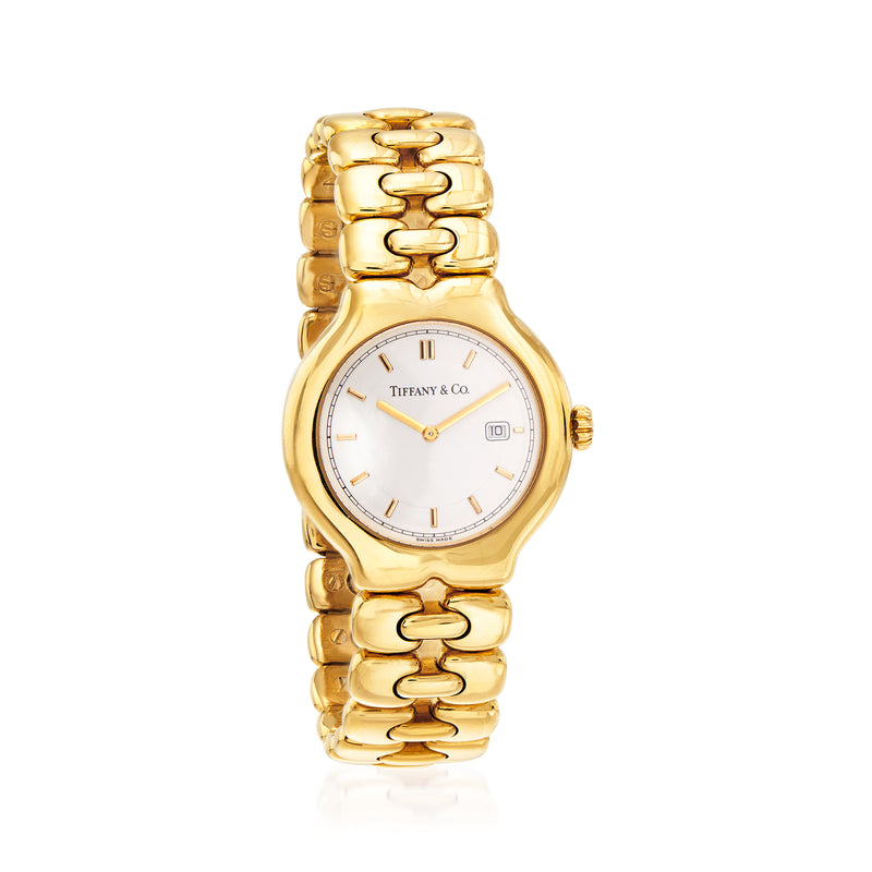 Vintage 18kt yellow gold bracelet watch with round white dial and Tiffany & Co. logo