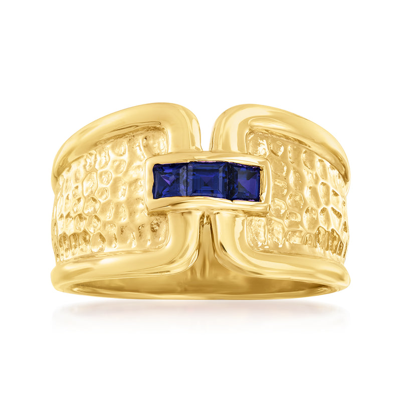 Gold buckle ring with dark blue square sapphire stone and textured band