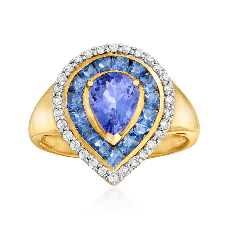 14kt yellow gold ring with pear-cut blue tanzanite, diamond halo, and sapphire side stones