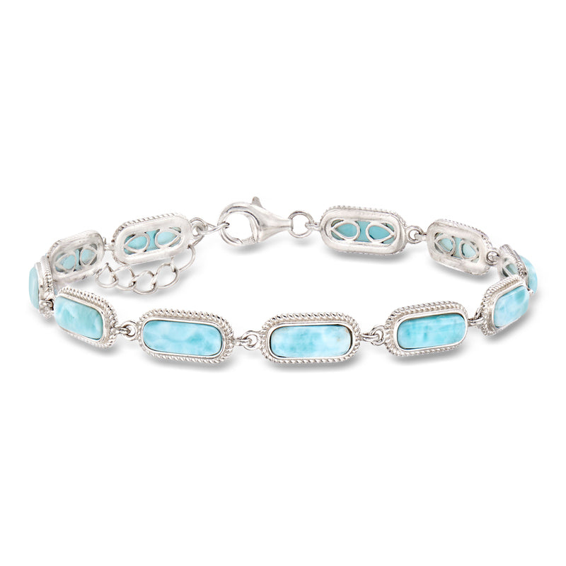 Sterling silver link bracelet with oval Larimar stones in light blue settings