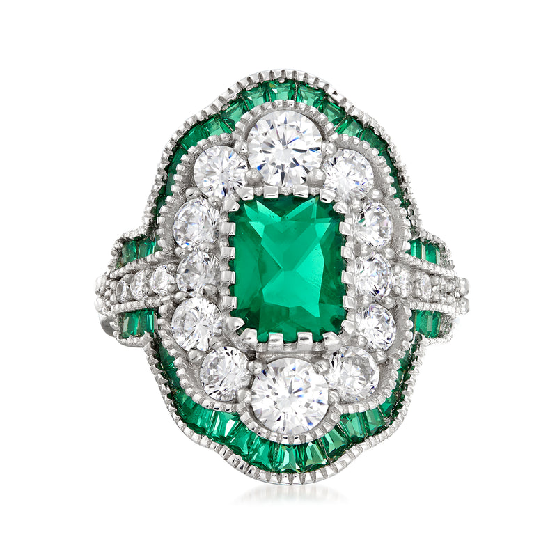 Sterling silver ring with emerald-green simulated center stone and CZ halo