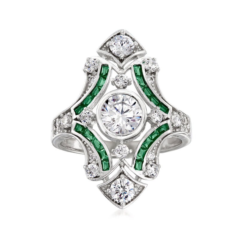 Sterling silver ring with round clear CZ center, green accents, and side stones