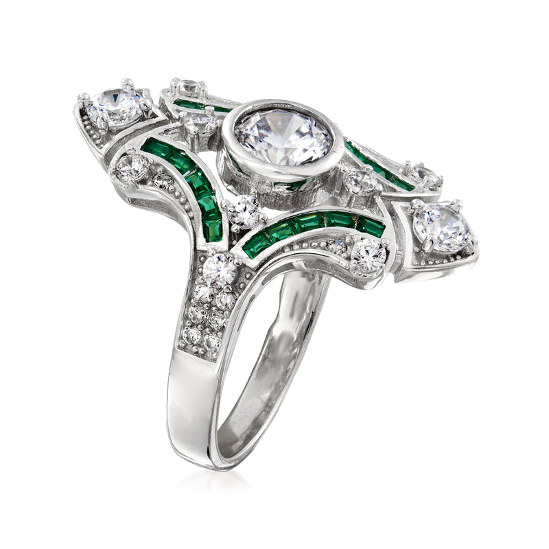 Sterling silver ring with round center CZ, green side bands, and prong-set stones