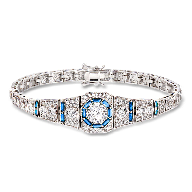 Sterling silver tennis bracelet with blue simulated sapphire center and CZ accents