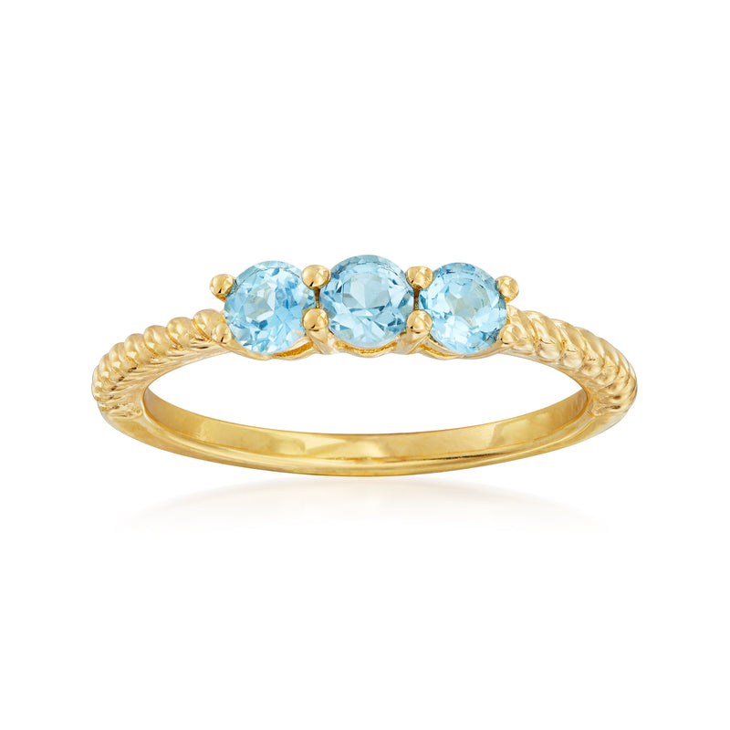 18kt gold over sterling ring with three round light blue gemstones and rope-style band