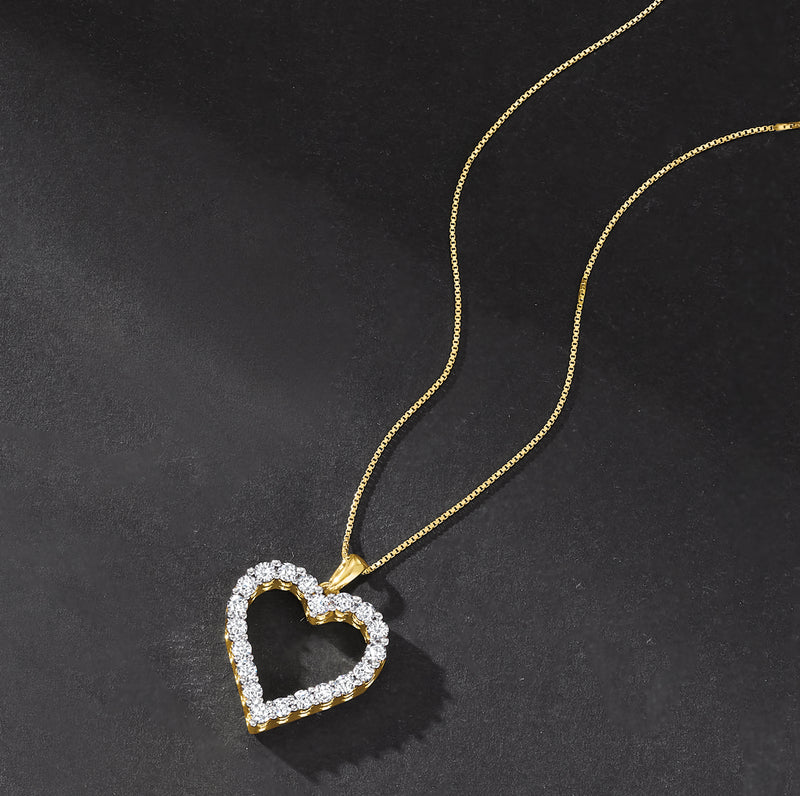 Diamond heart pendant necklace in gold over sterling