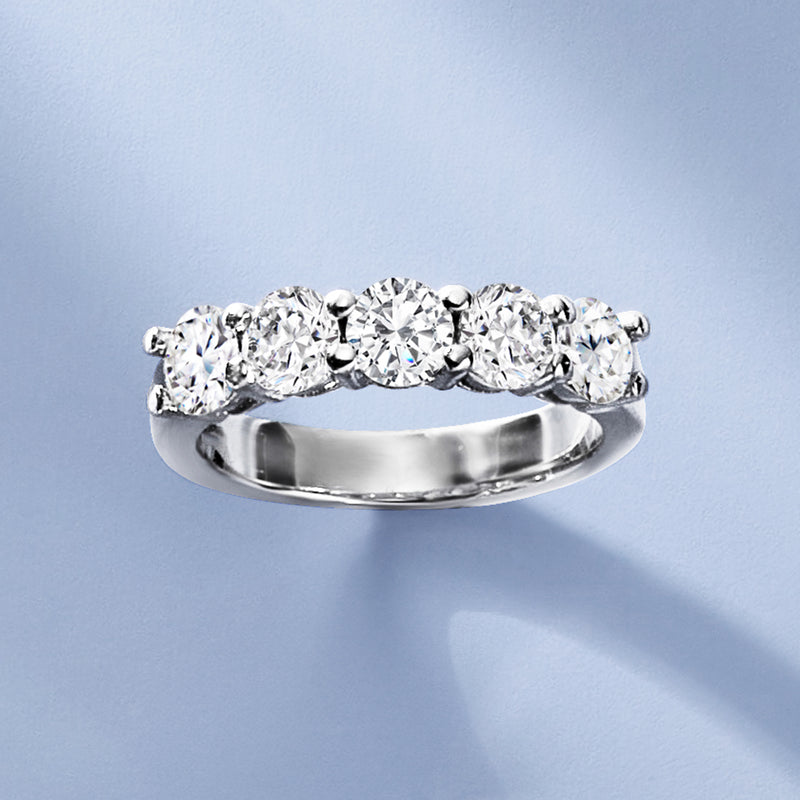 White gold five-stone diamond ring with five round stones in a shared setting