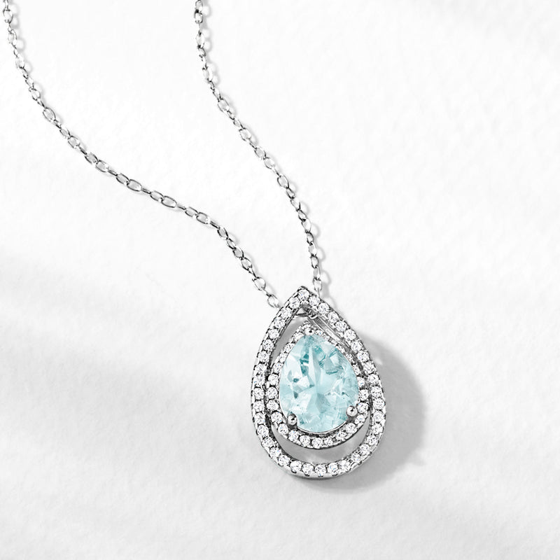 Sterling silver pear-shaped aquamarine pendant necklace with white topaz halo