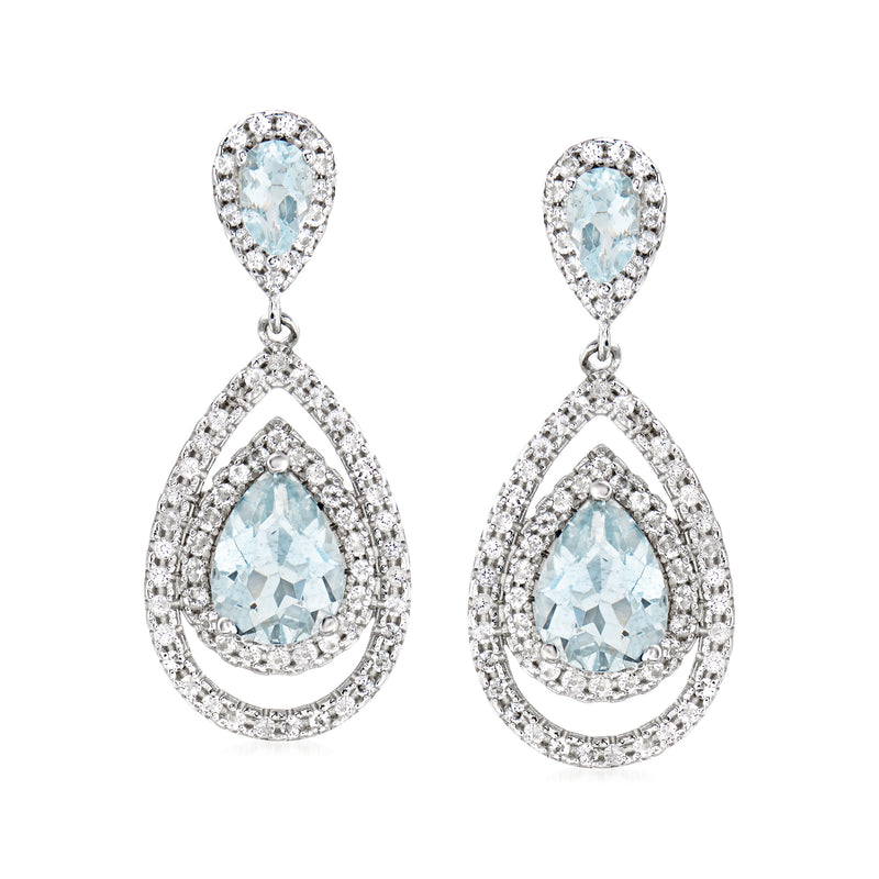 Sterling silver drop earrings with blue aquamarine and clear white topaz teardrops