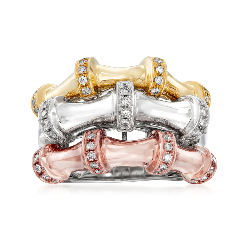 Tri-colored gold diamond station ring with three linked bands and sparkling stones