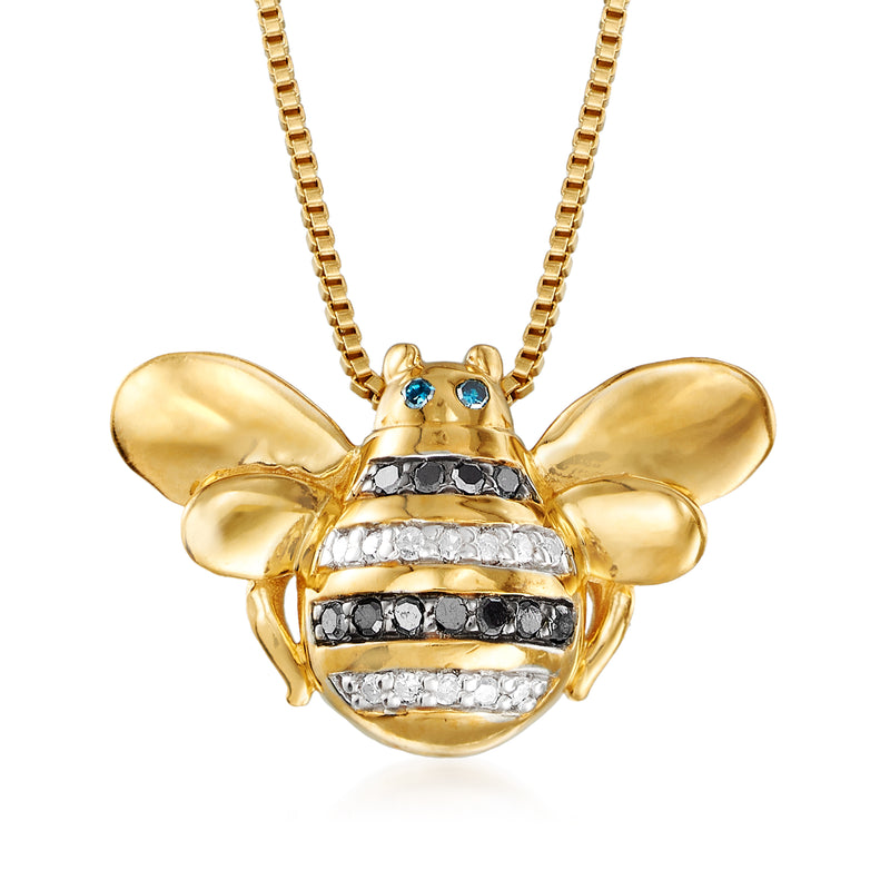 Gold-tone bumblebee pendant necklace with blue gem eyes and diamond accents