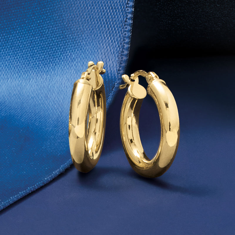 Yellow gold hoop earrings with hinge clasp, smooth round profile