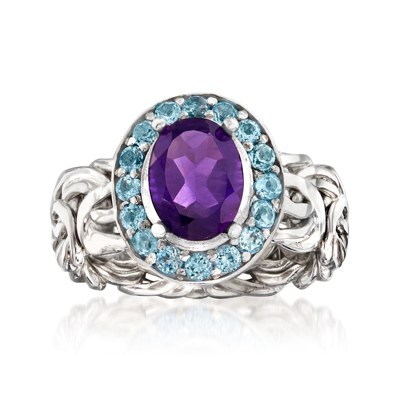 Sterling silver Byzantine ring with oval amethyst center and blue topaz halo