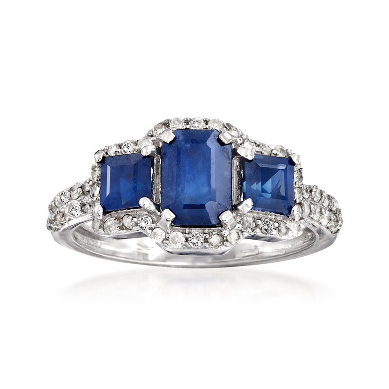 14kt white gold sapphire and diamond ring with blue center stone and halo of diamonds