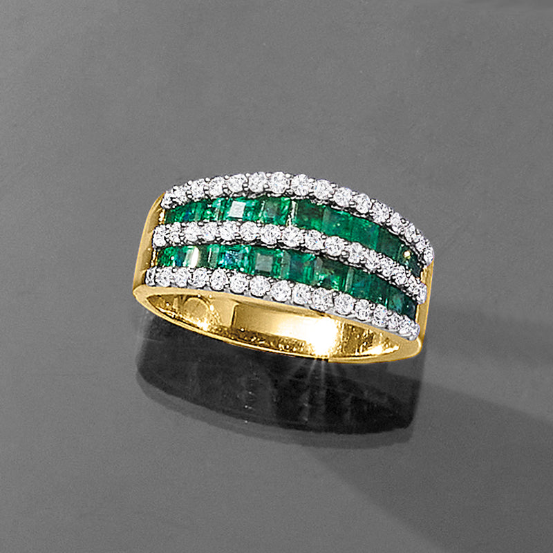 14kt yellow gold dome ring with emerald-green channel set strips and diamond border