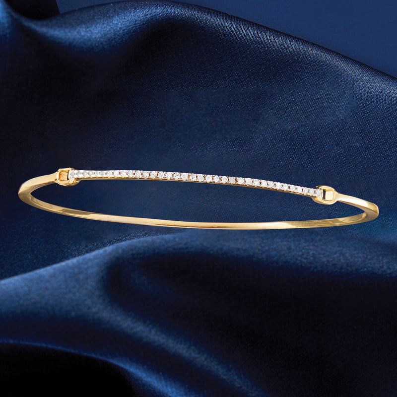 Diamond bar bangle bracelet in yellow gold over sterling silver