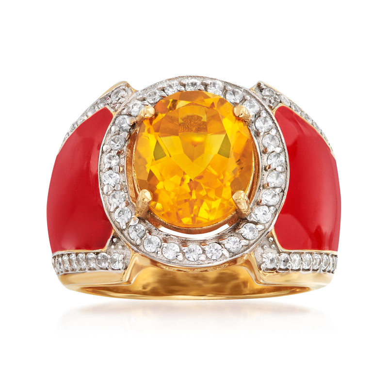 Gold-tone ring with oval yellow citrine center, white topaz halo, red enamel accents.
