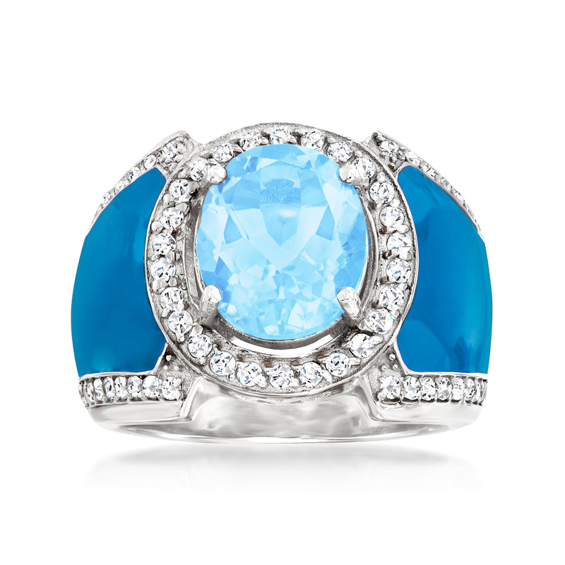 Sterling silver ring with oval Swiss Blue topaz, blue enamel, and white stone halo