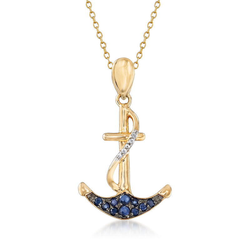 Gold-tone anchor pendant necklace with blue sapphire bezel stones and clear accents