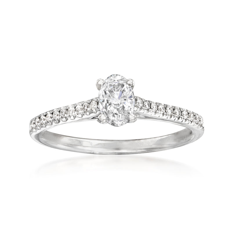 14kt white gold diamond engagement ring with oval center stone and pavé band