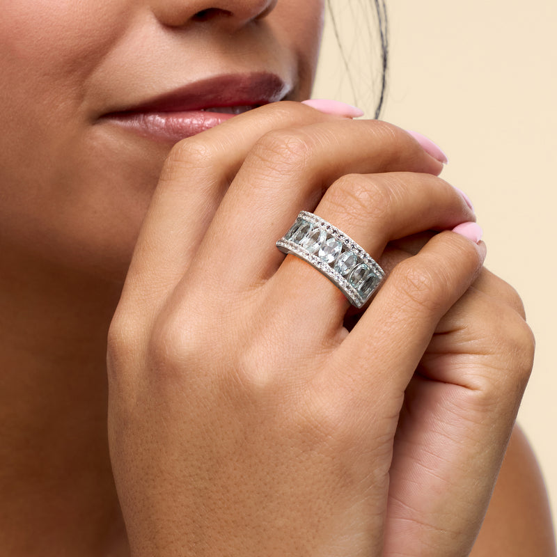 Aquamarine and white topaz sterling silver ring with wide pavé band