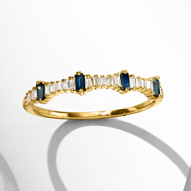 14kt yellow gold stackable ring with alternating blue sapphire and clear baguette stones