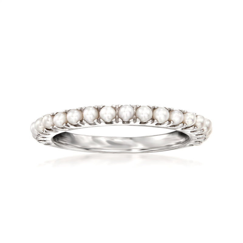 Cultured pearl ring in sterling silver with white round pearls, slim band.