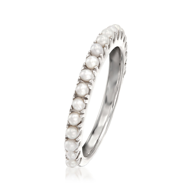 Cultured pearl ring in sterling silver with white round pearls, side view.