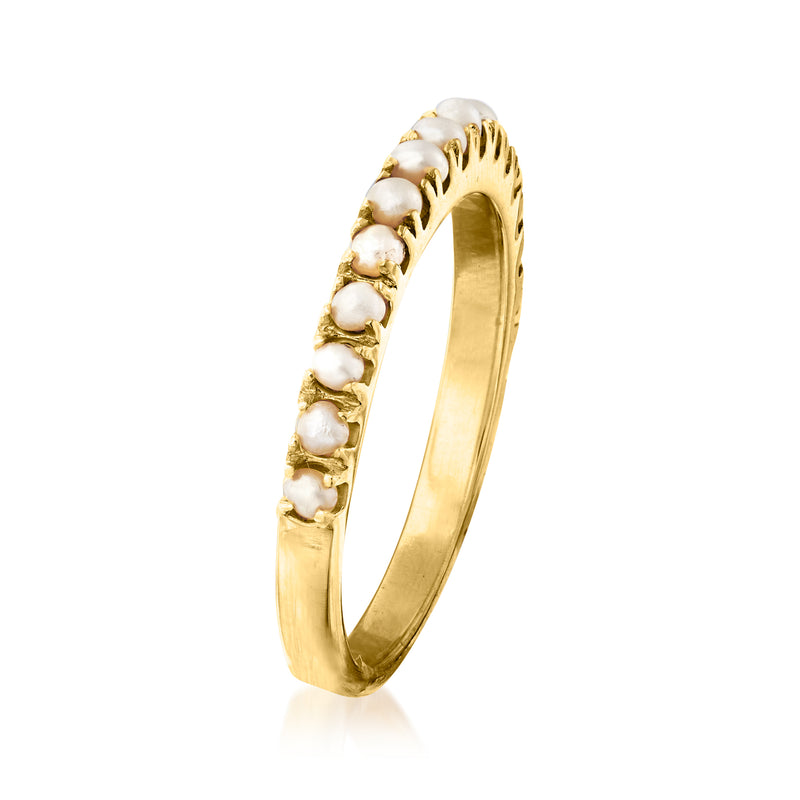 Gold over sterling band ring featuring a line of white cultured pearls