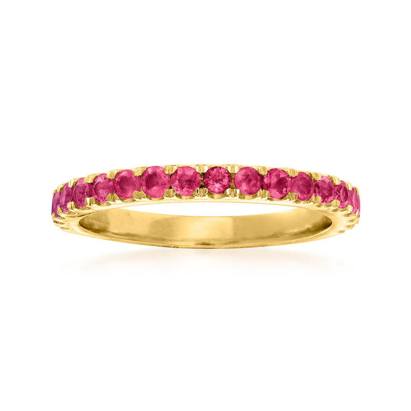 Gold ring with continuous row of pink ruby gemstones, round prong-set band