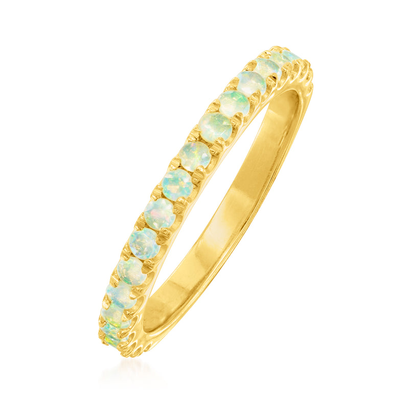 Opal band ring in gold over sterling with light blue oval stones on side