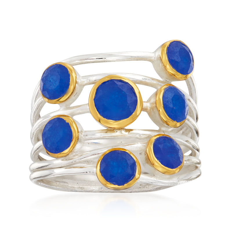 Sterling silver ring with multiple round blue quartz stones and gold-tone bezel settings