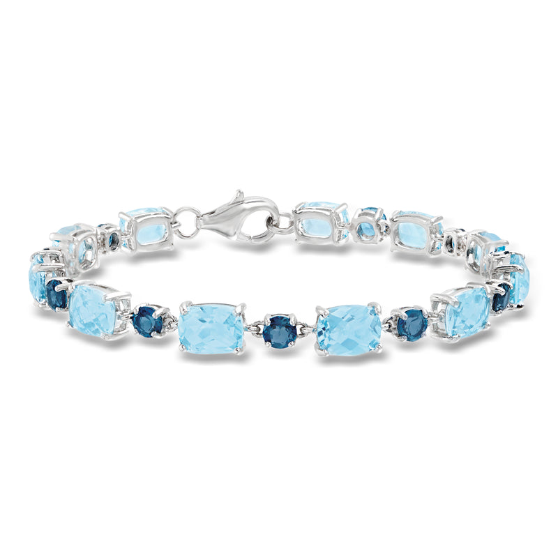 Sterling silver blue topaz tennis bracelet with light and dark blue gemstones