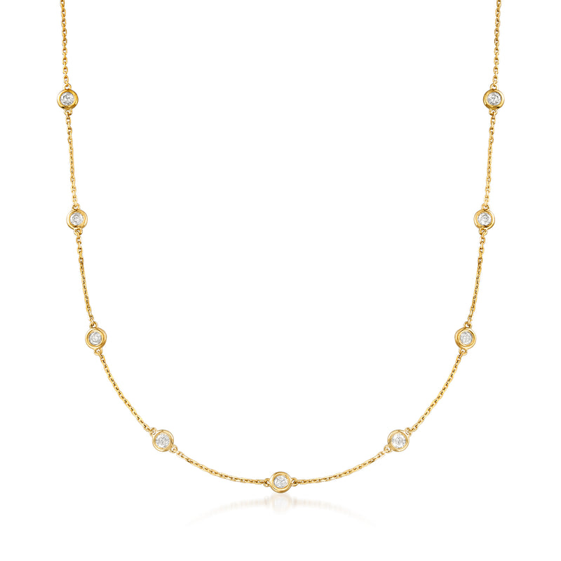 Gold over sterling diamond station necklace with bezel-set round stones, close view