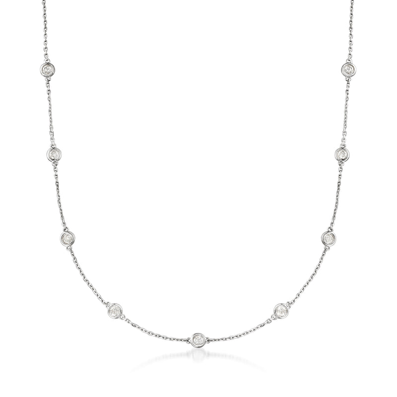 Sterling silver station necklace with bezel-set round diamonds and linked drops