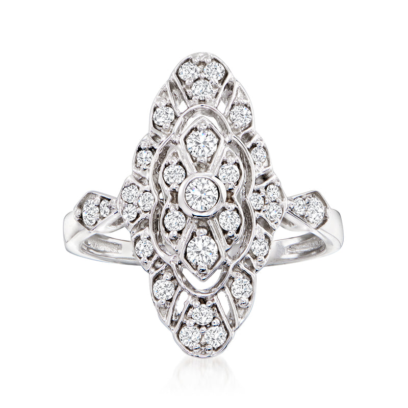 14kt white gold diamond openwork ring with oval center and round side stones