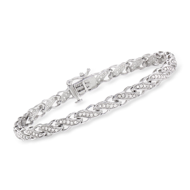 14kt white gold diamond infinity-style bracelet with linked oval settings and clasp