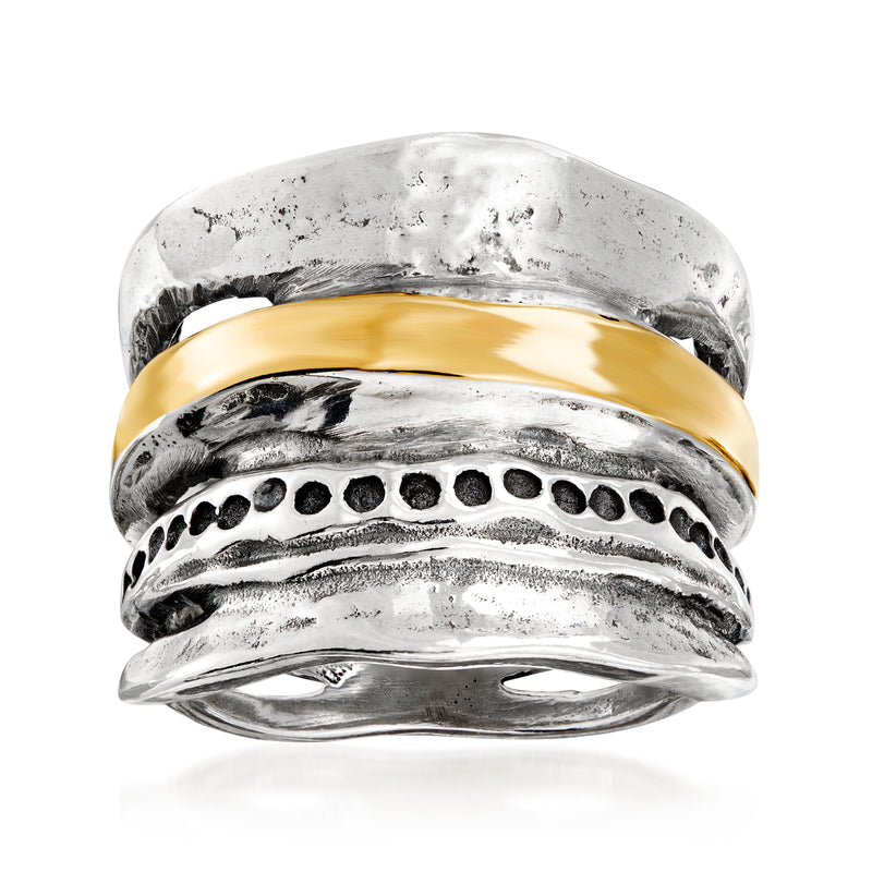 Sterling silver open-space ring with yellow gold band and oval engraved texture